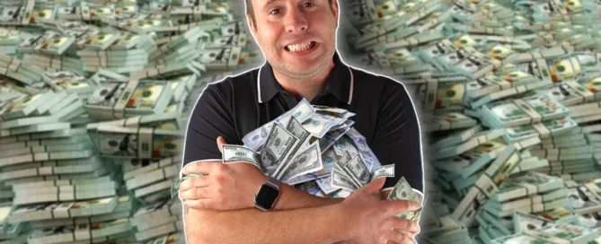 Mark Parham holding banknotes against a background of bundled money