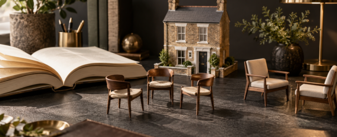 Model British homes and study materials illustrating property courses and personal mentoring